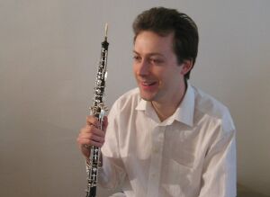 Guillaume Cuiller holding his oboe